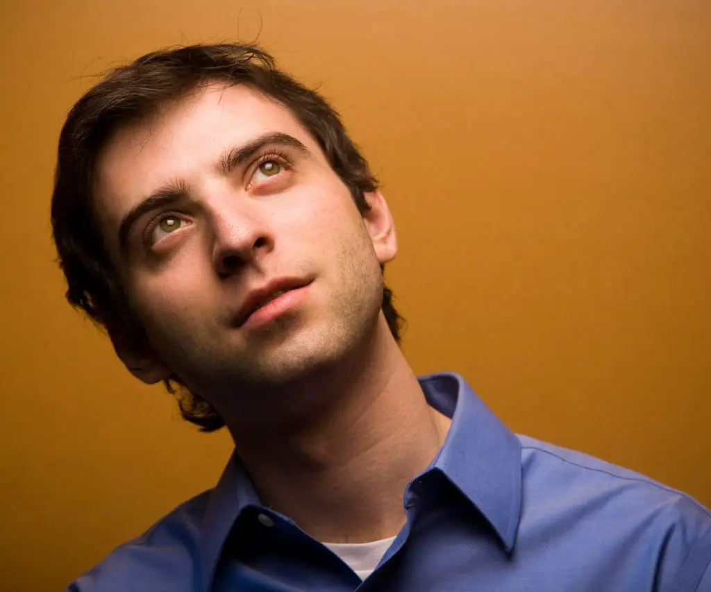 A man pondering the idea of using UV Lights in his HVAC