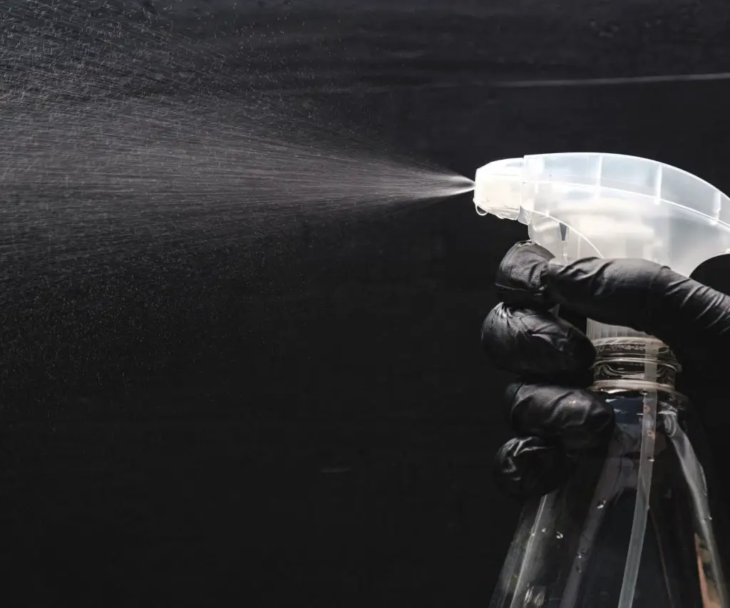 A picture of a spray bottle containing a homemade AC Coiler cleaner of bleach and water